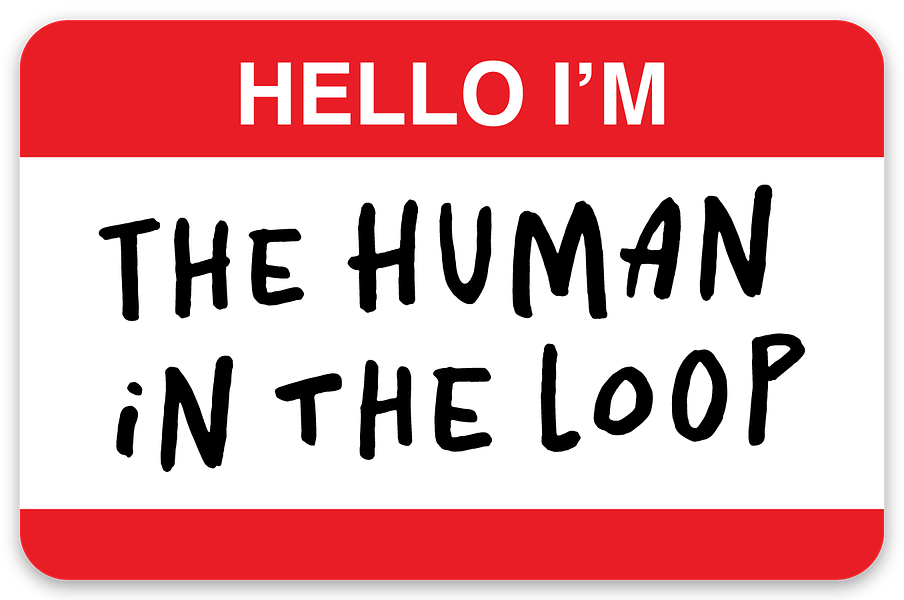 A rectangular sticker with rounded corners resembling a name tag. There is a red band at the top with the words “HELLO I'M” in white letters. Below that there is a handwritten text “THE HUMAN IN THE LOOP” in black on white.